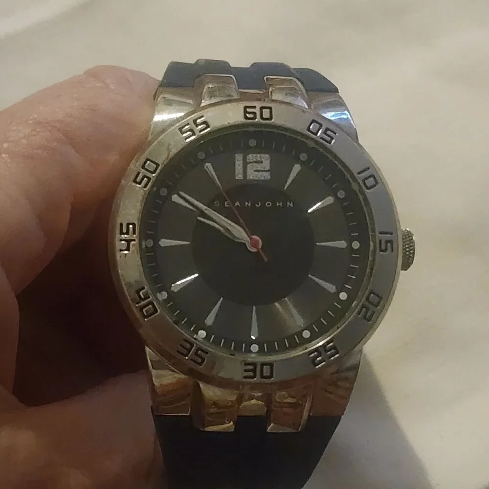 Sean John clear dial round